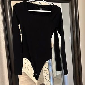 Black rubber bodysuit